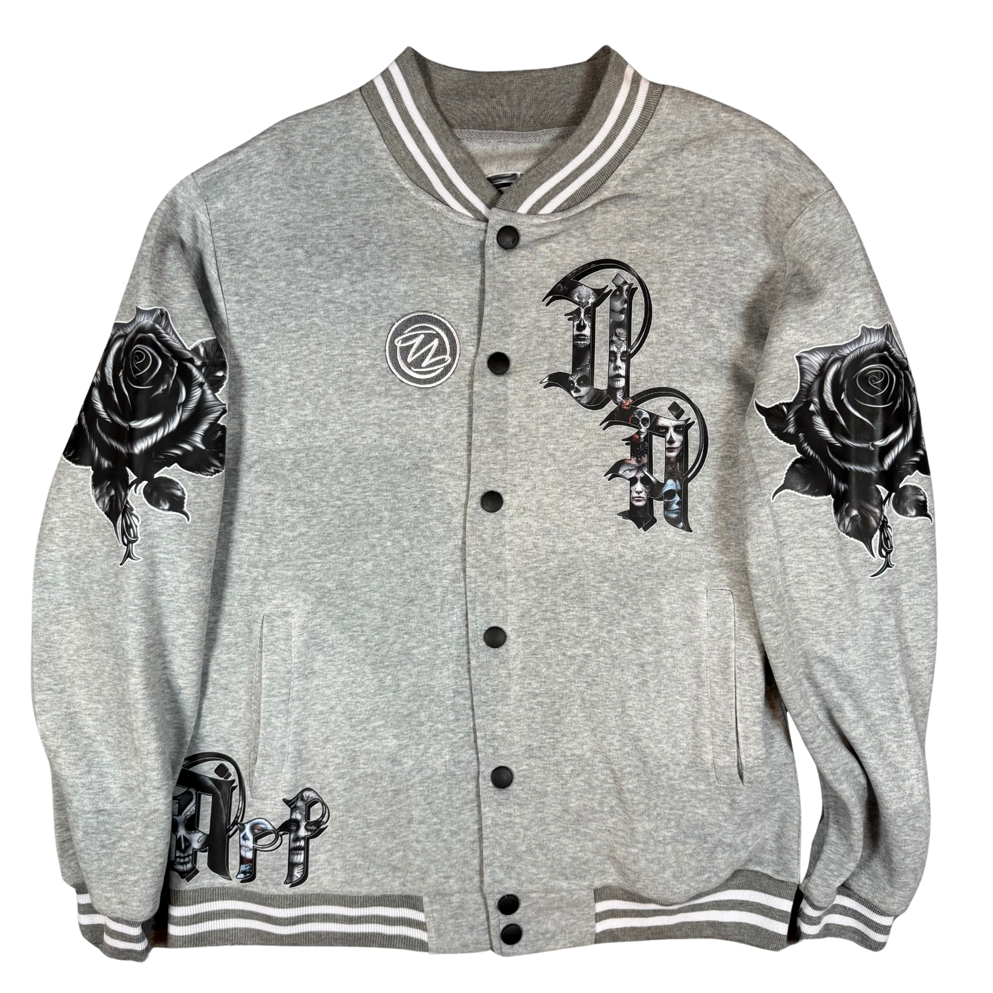 Front view of grey varsity bomber jacket with UA Day of the Dead letter artwork, black rose sleeves, front pockets, and snap-button closure.