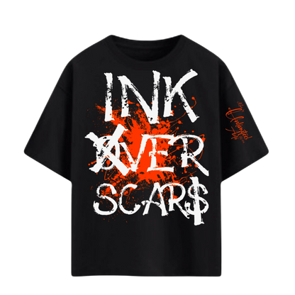 close up orange ink graphic on black oversized Ink Over Scars t-shirt
